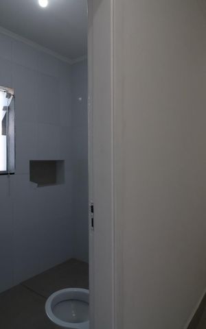 Casa à venda com 134m², 2 quartos e 2 vagasCorredor interno