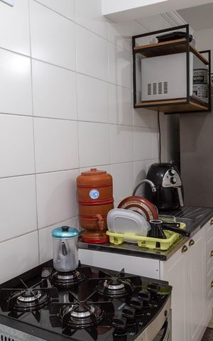 Apartamento à venda com 50m², 2 quartos e sem vaga Apartamento à venda com 50m², 2 quartos e sem vagaCozinha e Área de Serviço