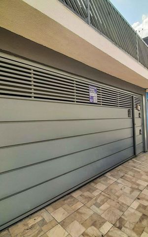 Casa à venda com 154m², 3 quartos e 2 vagas Casa à venda com 154m², 3 quartos e 2 vagasFachada da Casa e Placa