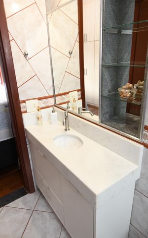 Casa à venda com 400m², 4 quartos e 5 vagasBanheiro 4