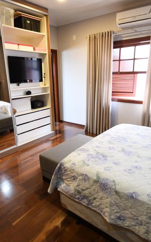 Casa à venda com 400m², 4 quartos e 5 vagasQuarto 4 - Suíte