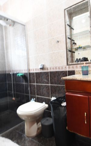 Casa à venda com 400m², 4 quartos e 5 vagasBanheiro 3