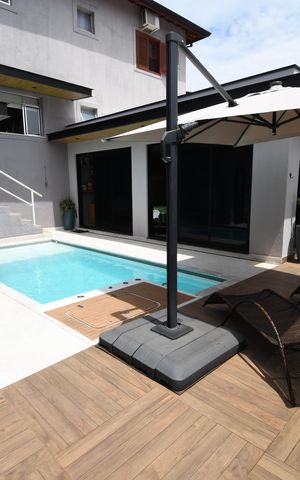 Casa à venda com 400m², 4 quartos e 5 vagasPiscina
