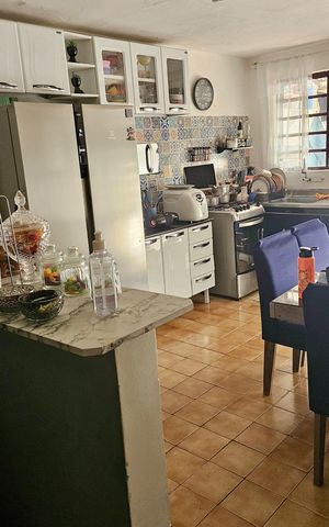 Casa à venda com 150m², 2 quartos e 2 vagas Casa à venda com 150m², 2 quartos e 2 vagasCozinha