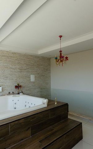 Casa para alugar com 390m², 3 quartos e 6 vagasSuíte 1 - hidromassagem