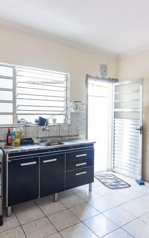 Casa à venda com 134m², 3 quartos e 2 vagas Casa à venda com 134m², 3 quartos e 2 vagasCozinha