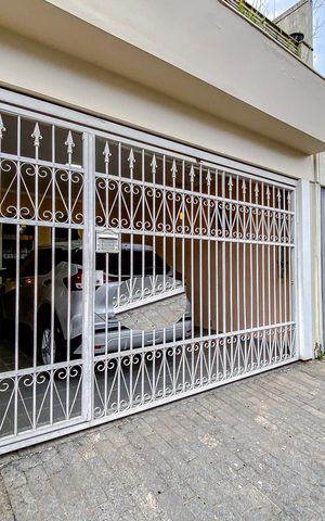 Casa à venda com 140m², 3 quartos e 2 vagasFachada e Plaquinha