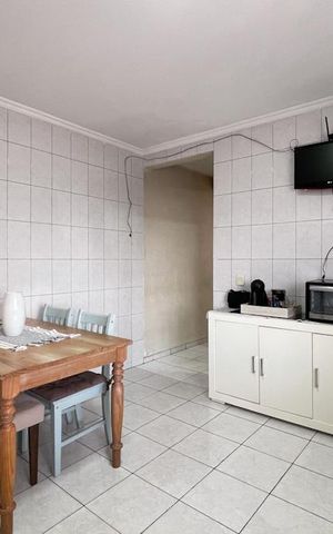 Casa à venda com 250m², 3 quartos e 3 vagas Casa à venda com 250m², 3 quartos e 3 vagasCozinha