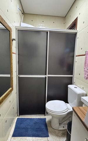 Casa à venda com 67m², 2 quartos e 1 vaga Casa à venda com 67m², 2 quartos e 1 vagaBanheiro