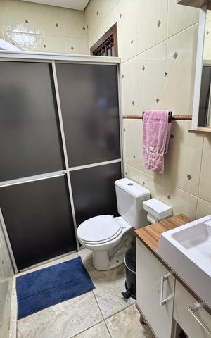 Casa à venda com 67m², 2 quartos e 1 vaga Casa à venda com 67m², 2 quartos e 1 vagaBanheiro