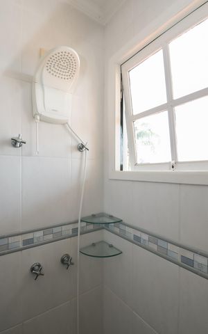 Casa de condomínio à venda com 115m², 3 quartos e 2 vagasBanheiro Social