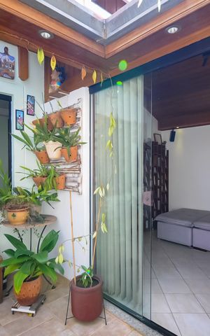 Casa de condomínio à venda com 115m², 3 quartos e 2 vagasQuintal