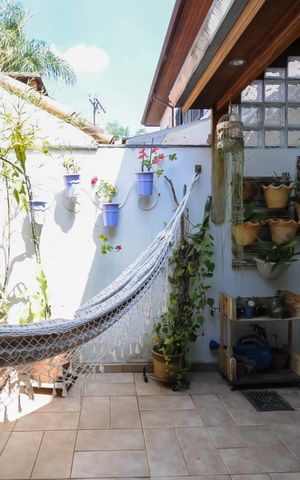 Casa de condomínio à venda com 115m², 3 quartos e 2 vagasQuintal