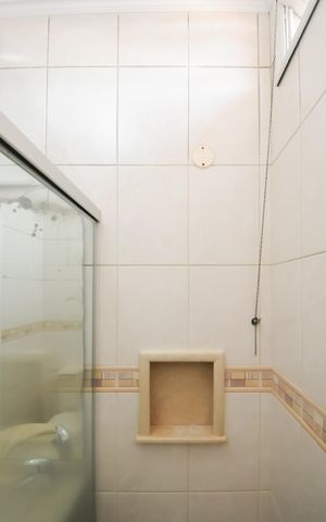 Casa de condomínio à venda com 115m², 3 quartos e 2 vagasBanheiro da Suíte