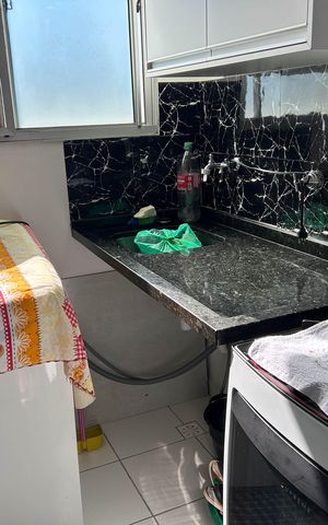 Casa de condomínio à venda com 48m², 2 quartos e 1 vaga Casa de condomínio à venda com 48m², 2 quartos e 1 vagaCozinha e lavanderia