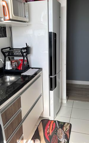 Casa de condomínio à venda com 48m², 2 quartos e 1 vaga Casa de condomínio à venda com 48m², 2 quartos e 1 vagaCozinha e lavanderia