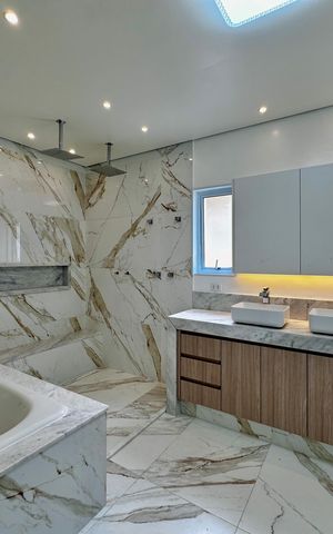 Casa à venda com 430m², 4 quartos e 6 vagas Casa à venda com 430m², 4 quartos e 6 vagasBanheiro Suíte 4