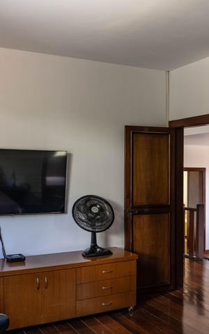 Casa à venda com 450m², 4 quartos e 4 vagas Casa à venda com 450m², 4 quartos e 4 vagasSuíte 1
