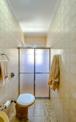 Casa à venda com 411m², 5 quartos e 6 vagasBanheiro da Suíte