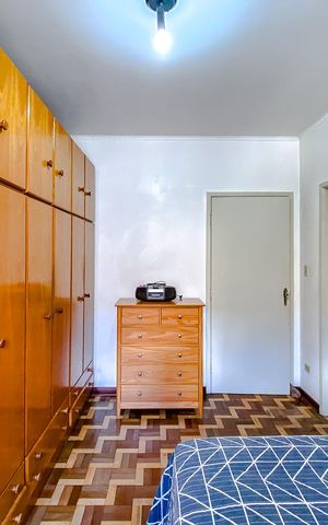 Casa à venda com 411m², 5 quartos e 6 vagasQuarto 1 - Suíte