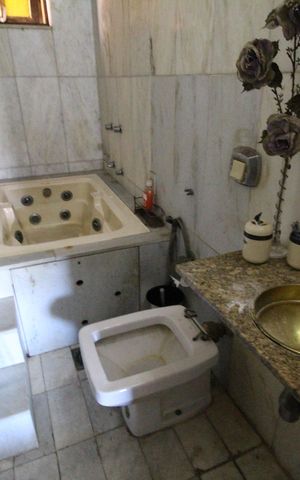Casa de condomínio à venda com 307m², 3 quartos e 2 vagasBanheiro da suíte
