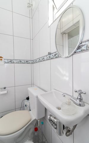 Casa à venda com 141m², 3 quartos e 4 vagasBanheiro da Área de Serviço