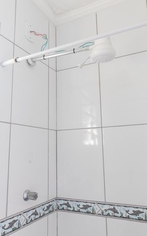 Casa à venda com 141m², 3 quartos e 4 vagasBanheiro da Área de Serviço