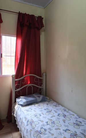 Casa à venda com 48m², 2 quartos e 2 vagasQuarto 1