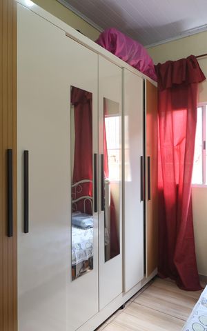Casa à venda com 48m², 2 quartos e 2 vagasQuarto 1