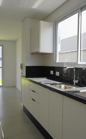 Casa de condomínio para alugar com 120m², 3 quartos e 2 vagasCozinha