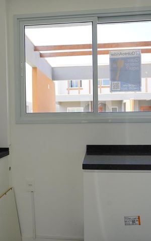 Casa de condomínio para alugar com 120m², 3 quartos e 2 vagasCozinha e Área de Serviço