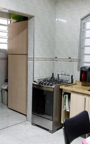 Casa à venda com 274m², 5 quartos e 2 vagas Casa à venda com 274m², 5 quartos e 2 vagasCozinha