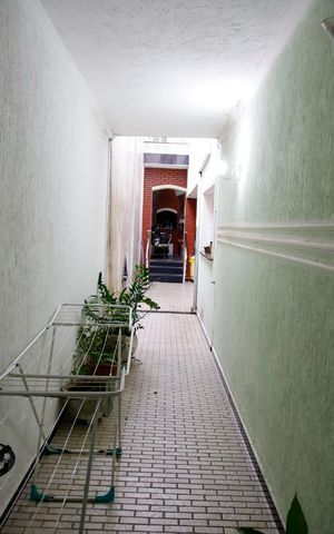 Casa à venda com 120m², 3 quartos e 2 vagas Casa à venda com 120m², 3 quartos e 2 vagasCorredor