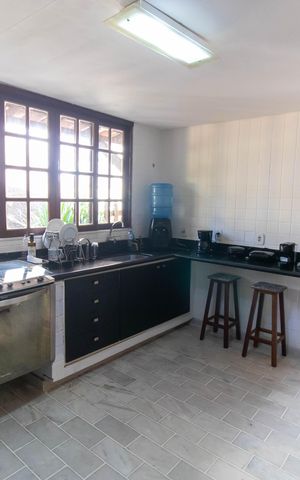 Casa de condomínio à venda com 310m², 4 quartos e 3 vagas Casa de condomínio à venda com 310m², 4 quartos e 3 vagasCozinha
