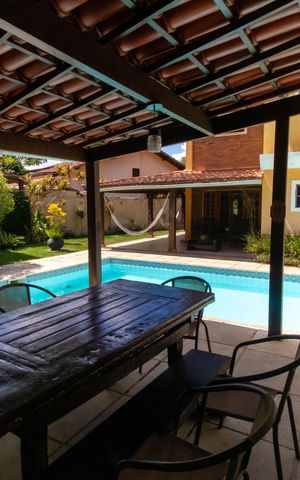 Casa de condomínio à venda com 310m², 4 quartos e 3 vagas Casa de condomínio à venda com 310m², 4 quartos e 3 vagasÁrea externa