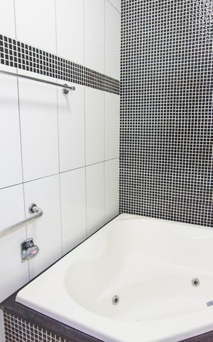 Casa para alugar com 250m², 3 quartos e 3 vagasBanheiro da Suite