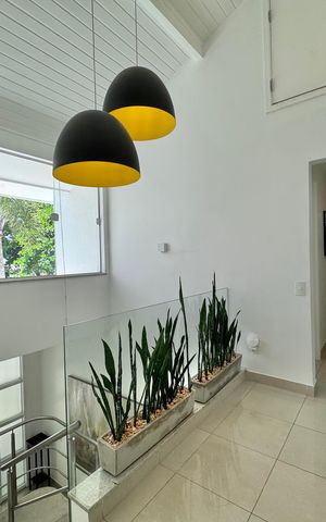 Casa de condomínio à venda com 430m², 6 quartos e 3 vagas Casa de condomínio à venda com 430m², 6 quartos e 3 vagasHall Íntimo