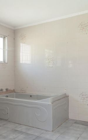 Casa à venda com 252m², 3 quartos e 4 vagasBanheiro suite