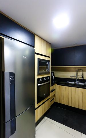 Casa à venda com 110m², 3 quartos e 2 vagas Casa à venda com 110m², 3 quartos e 2 vagasCozinha