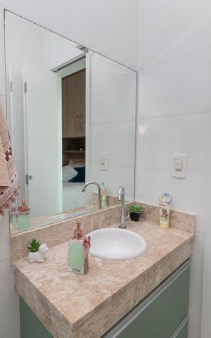 Casa à venda com 90m², 2 quartos e 2 vagasBanheiro da Suíte 1