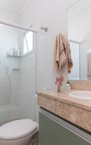 Casa à venda com 90m², 2 quartos e 2 vagasBanheiro da Suíte 1