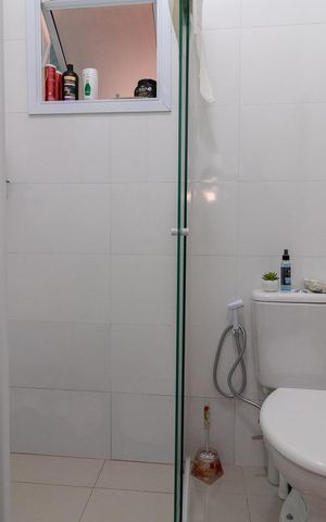 Casa à venda com 90m², 2 quartos e 2 vagasBanheiro da Suíte 2