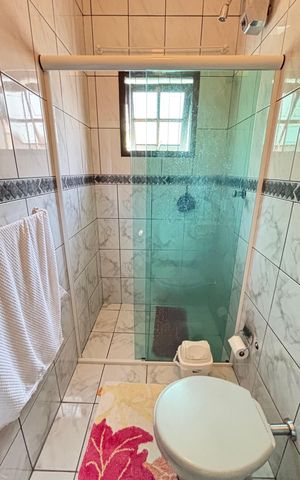 Casa à venda com 128m², 4 quartos e 4 vagas Casa à venda com 128m², 4 quartos e 4 vagasBanheiro da Suíte 3