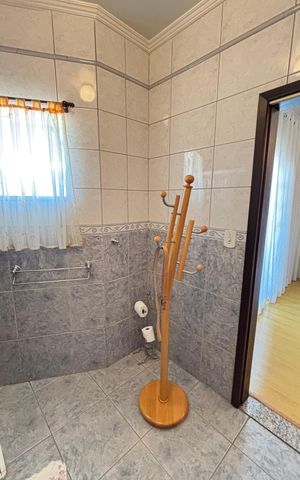 Casa à venda com 128m², 4 quartos e 4 vagas Casa à venda com 128m², 4 quartos e 4 vagasBanheiro da Suíte 1