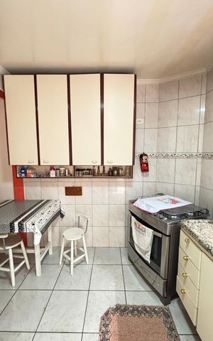 Casa à venda com 128m², 4 quartos e 4 vagas Casa à venda com 128m², 4 quartos e 4 vagasCozinha