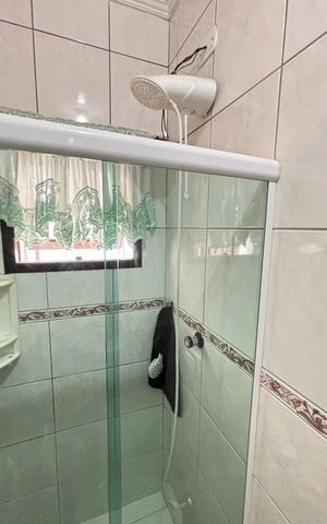 Casa à venda com 128m², 4 quartos e 4 vagas Casa à venda com 128m², 4 quartos e 4 vagasBanheiro da Suíte 2