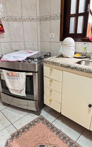 Casa à venda com 128m², 4 quartos e 4 vagas Casa à venda com 128m², 4 quartos e 4 vagasCozinha