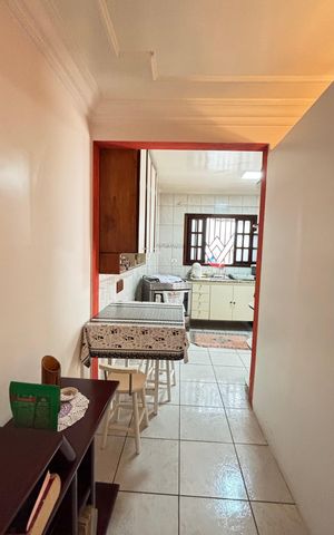 Casa à venda com 128m², 4 quartos e 4 vagas Casa à venda com 128m², 4 quartos e 4 vagasCozinha