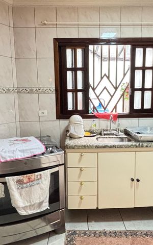 Casa à venda com 128m², 4 quartos e 4 vagas Casa à venda com 128m², 4 quartos e 4 vagasCozinha