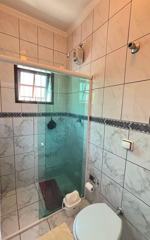 Casa à venda com 128m², 4 quartos e 4 vagas Casa à venda com 128m², 4 quartos e 4 vagasBanheiro da Suíte 3